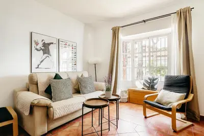 a living room with a couch and a table at Fabiana in Chiclana de la Frontera