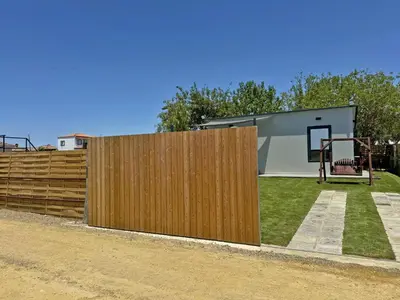 a wooden fence in front of a house at Casa Las Mironas I - Ole Solutions in El Puerto de Santa María