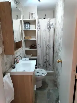 a bathroom with a toilet and a sink and a shower at apartamento en Puerto Real in El Trocadero