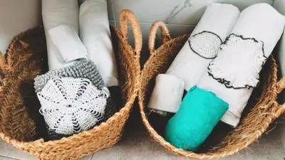 a group of towels in baskets on the floor at Trix I in Chiclana de la Frontera