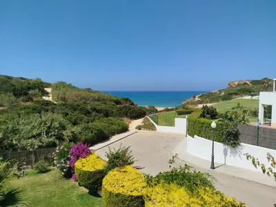a view of the ocean from a house at Conil Beach View Front House - Espectacular Casa con Vistas al Mar y acceso directo a la Playa in Conil de la Frontera
