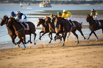 a group of people riding horses on the beach at Sibs Sanlucar Altamar Nuevo Centrico Tranquilo in Sanlúcar de Barrameda