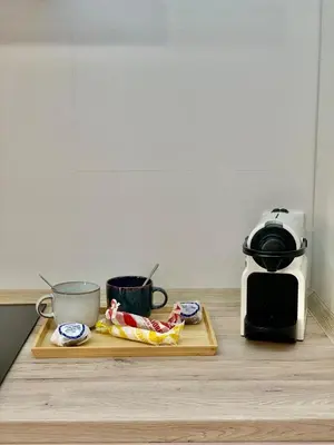 a kitchen counter with a cutting board and a toaster at Pimenium 318 in Medina Sidonia