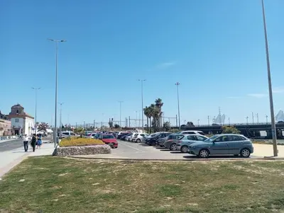 a bunch of cars parked in a parking lot at La parada in El Puerto de Santa María