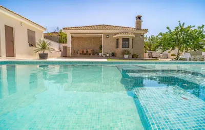 a large swimming pool in front of a house at Nice Home In Arcos De La Frontera in Arcos de la Frontera
