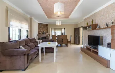 a living room with a couch and a table at Nice Home In Arcos De La Frontera in Arcos de la Frontera