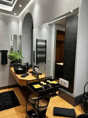 a bathroom with a sink and a counter with a mirror at BASTINAZO ALOHADREAM - EXCLUSIVO - Design Suite Luxury Love and Spa - Jacuzzi y Sauna Privados in El Puerto de Santa María