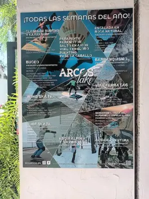 a poster on a wall with a collage of pictures at Casa 1 dormitorio con piscina privada y jardin in Arcos de la Frontera