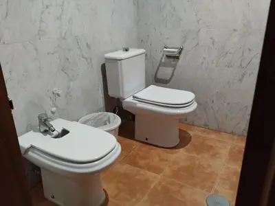 a bathroom with a toilet and a sink at Apartamentos Jasmund - Estudio 0 in San Fernando