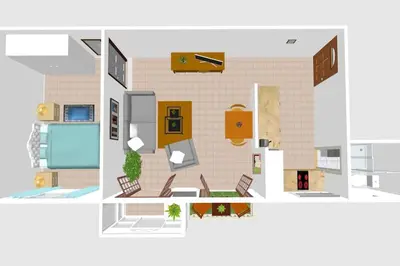 a floor plan of a house with furniture at Apartamento 'Mini Jungle' en el corazón de Cádiz in Cádiz