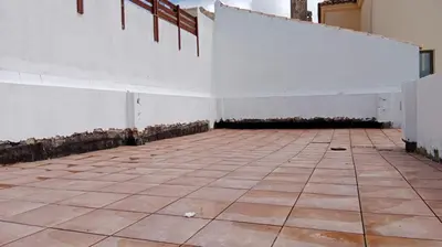 an empty room with white walls and a tile floor at Apartamento Gloria Bendita in Jerez de la Frontera
