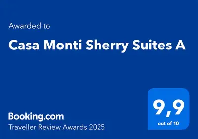 a blue sign with the textouched to csa mount sherry suites at Casa Monti - Sherry Suites A in Jerez de la Frontera