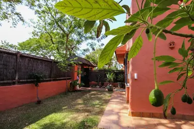 a house with a fence and a yard at Casa de lujo en Las Redes in El Puerto de Santa María