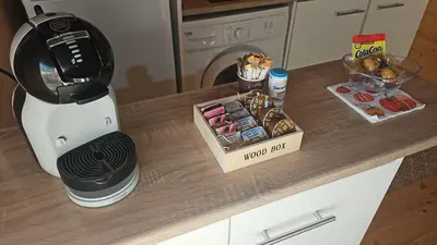 a food processor and a box of food on a counter at Bungalow Luna in Chiclana de la Frontera