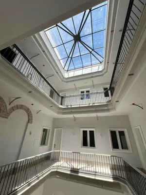 a skylight in a building with a ceiling at Urania Cadiz Apartments by Soho Boutique in Cádiz