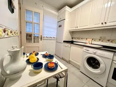 a kitchen with two rubber ducks on plates on a table at GATU el Capitán 