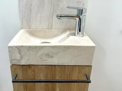a bathroom sink with a faucet on a counter at La Buganvilla in Chiclana de la Frontera
