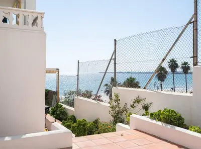 a balcony with a view of the ocean at Apartoyou - Sol y Playa Goleta in El Puerto de Santa María