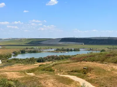 a river in the middle of a field at Mika's House Valley in Sanlúcar de Barrameda