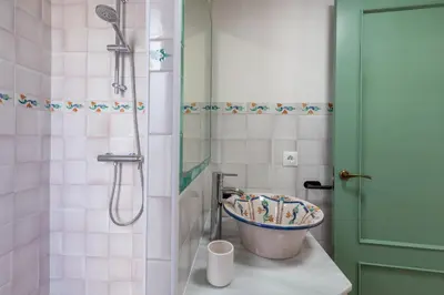 a bathroom with a shower with a toilet in it at Apartamento Isaac Peral 3 in Chipiona