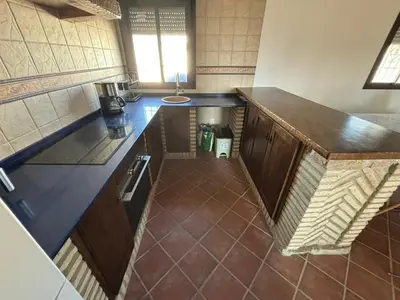 an overhead view of a kitchen with a counter top at Villa Los abuelos in Hozanejos