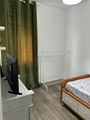 a living room with a couch and a table at Apartamento Valdés in El Puerto de Santa María