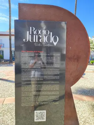 a sign for a rockato jimoco guitar festival at La Longuera - Playa Cruz del Mar in Chipiona