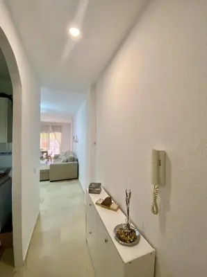 a white room with a sink on a white wall at Novo Sancti Petri LUZ DEL NOVO in Novo Sancti Petri