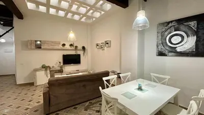 a living room with a couch and a table at Estudio de Mia in Cádiz
