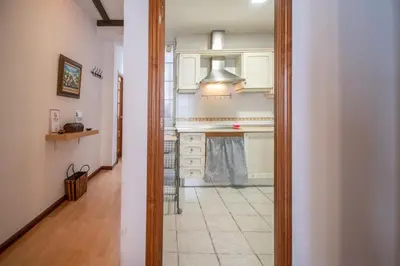 a view of a kitchen from the hallway at Apartamento Santa M Serenity Cadiz in Cádiz