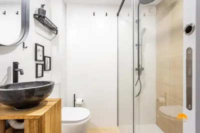 a bathroom with a sink and a toilet at Brisa de Verano by Cadiz Time in Cádiz