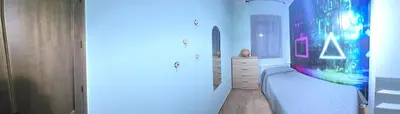 a bathroom with a large painting on the wall at Sancti Petri in Chiclana de la Frontera