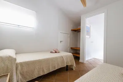 a bathroom with a shower and a toilet and a sink at GuestReady - Cabiedes Marina Golf JC in Rota