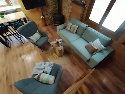 an overhead view of a living room with a couch and chairs at Casa Pinares de Roche tres dormitorios in Cádiz