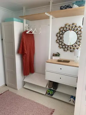 a dressing room with a mirror and a dresser at Casa Calle Merced in Cádiz