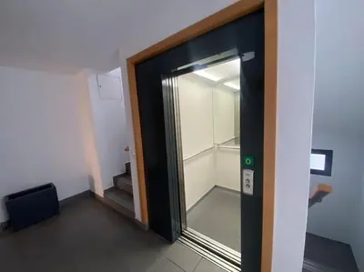 a glass door in a room with a walk in closet at Apartamento Mati, Terraza 55 m2 in Sanlúcar de Barrameda