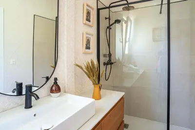 a bathroom with a sink and a shower at casa Villa Escondida in Cádiz