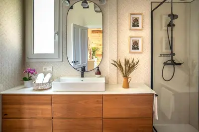 a bathroom with a sink and a mirror at casa Villa Escondida in Cádiz
