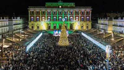 a large crowd of people standing in front of a building at Casa Cervera in San Fernando