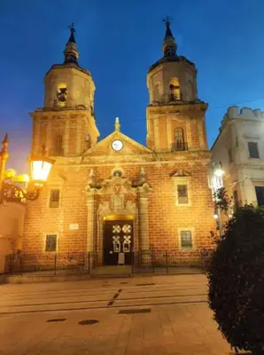 a large building with two towers on top of it at Casa Cervera in San Fernando