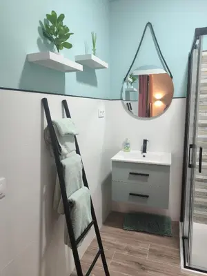 a bathroom with a sink and a mirror at Casa Cervera in San Fernando