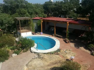 an overhead view of a swimming pool with a gazebo at Casa Yuxiao rincón de tranquilidad in Cádiz