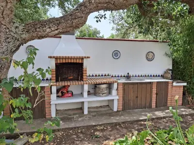 a barbecueificialificialificialificialificialificialificialificialificialificialificialificialificialificial at Casa Yuxiao rincón de tranquilidad in Cádiz
