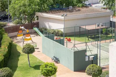 an aerial view of a park with a playground at Piso de la Manzanilla in Sanlúcar de Barrameda