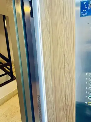 a close up of a stainless steel refrigerator at El Corner de Esquivel Grupo AC Gestion in Cádiz