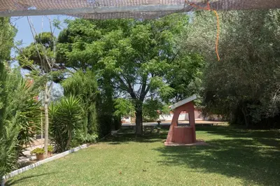 a park with a playground in the grass at Chalet Enol Sol in Chiclana de la Frontera