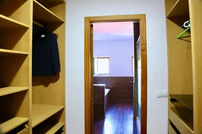 a closet with a door open to a hallway at Chalet independiente en la loma in Chiclana de la Frontera