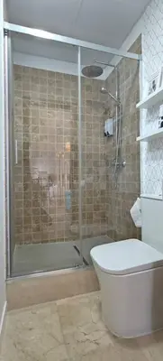 a bathroom with a shower and a toilet at Los Jereles. in Jerez de la Frontera
