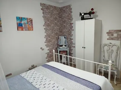 a living room with a couch and a table at El rincón de Nai in Chiclana de la Frontera