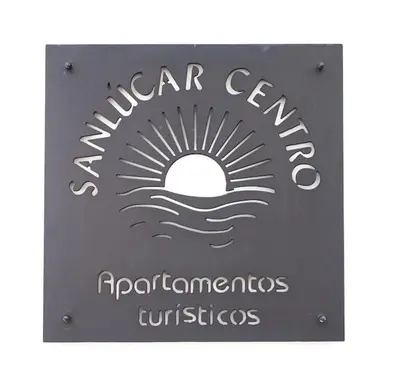 a sign for a water center with the sun and waves at Sanlucar Centro - Apartamento 1 in Sanlúcar de Barrameda